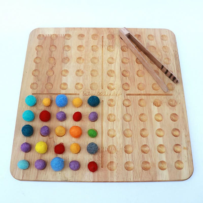 Introduce counting, pattern formation, and multiplication with the 100 Board – a versatile educational tool for fine motor development and early math skills.