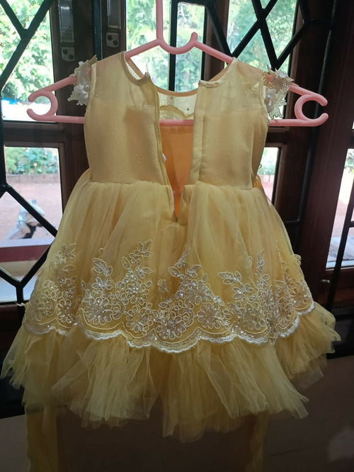Yellow dress with lace details