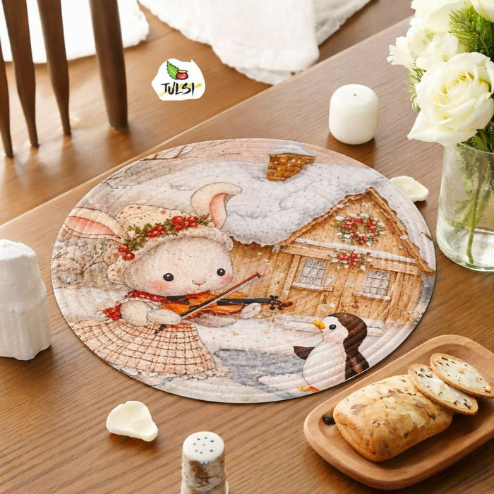 Round placemat with a winter scene design featuring a rabbit playing a violin