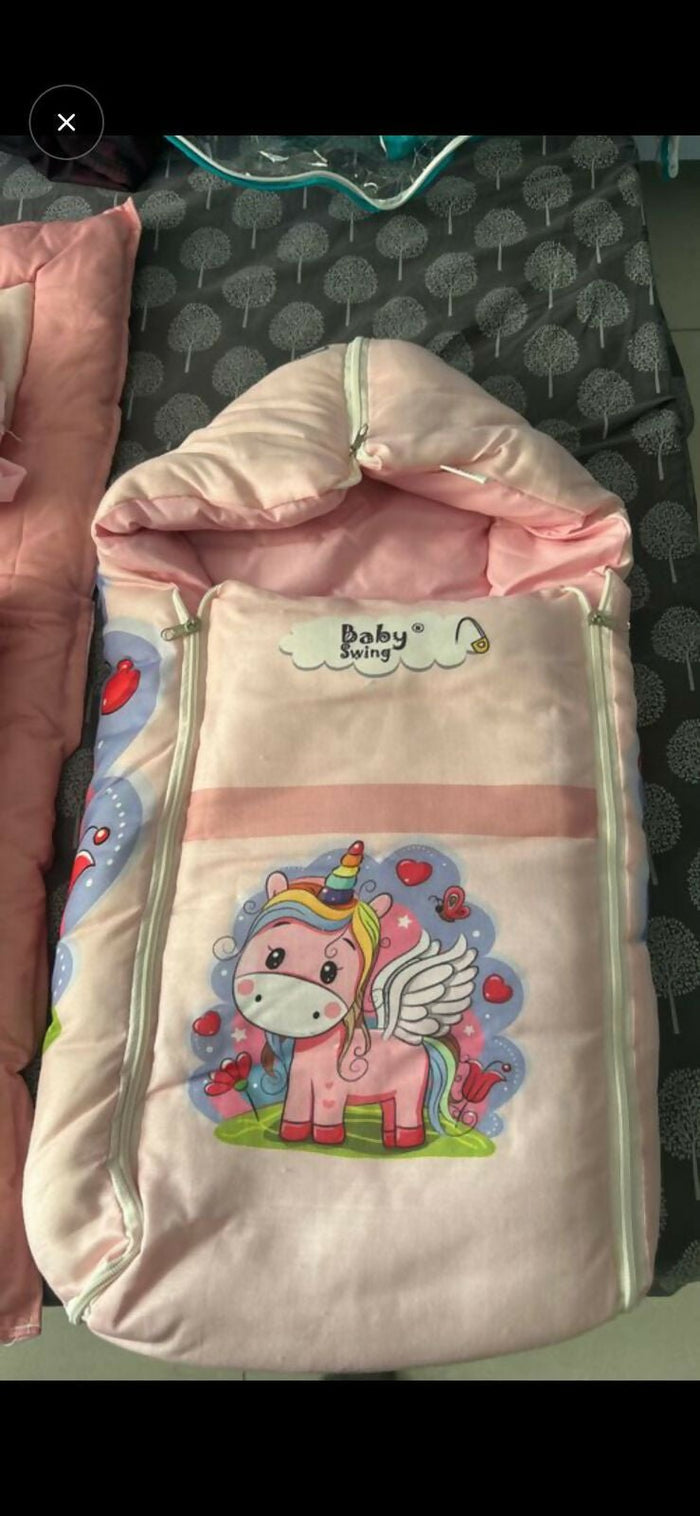 Pink baby bag with unicorn design