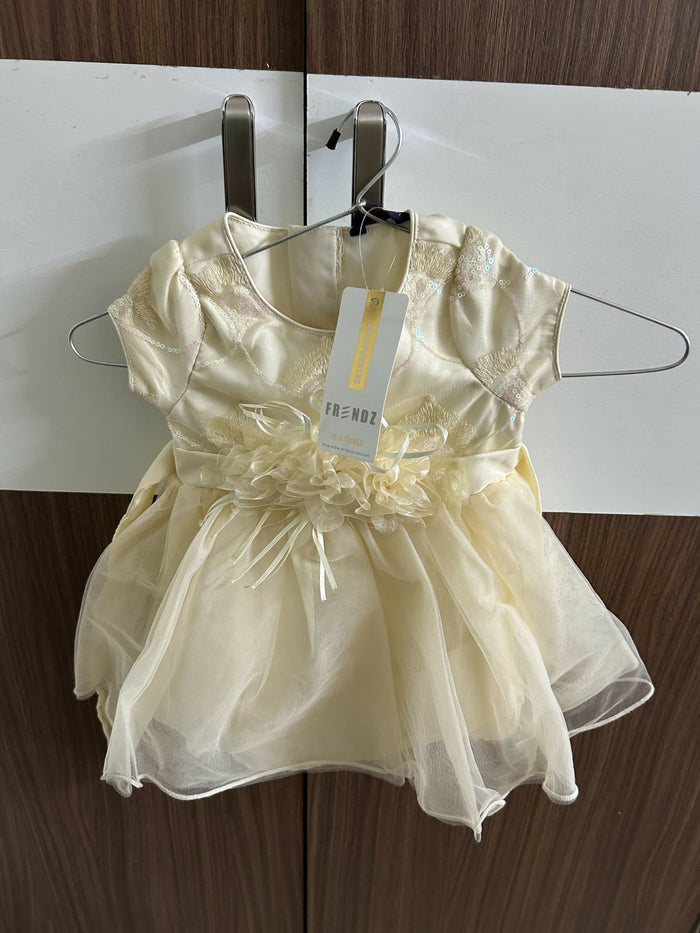 Yellow dress with a tag
