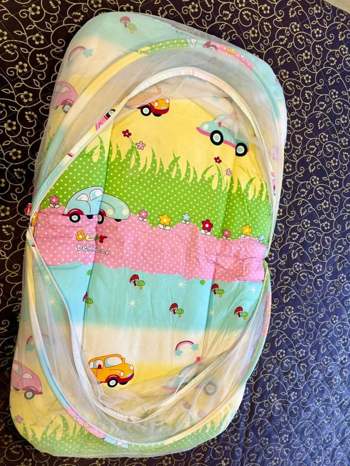 BABYHUG baby bed with mosquito net – safe, soft, and travel-friendly.