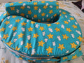 BABYHUG Cotton Feeding Pillow with Belt in Blue Star Print, Almost New condition, featuring soft cushioned support, comfortable cotton fabric, and a secure belt for convenient breastfeeding and bottle-feeding sessions.