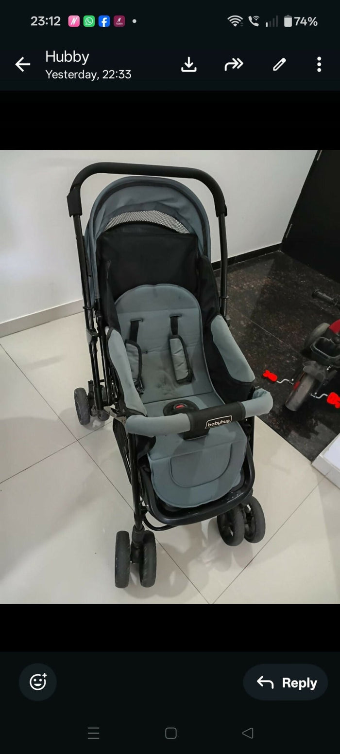 Babyhug Symphony stroller with reclining seat, smooth wheels, safety harness, adjustable canopy, and comfortable travel design for babies and toddlers.