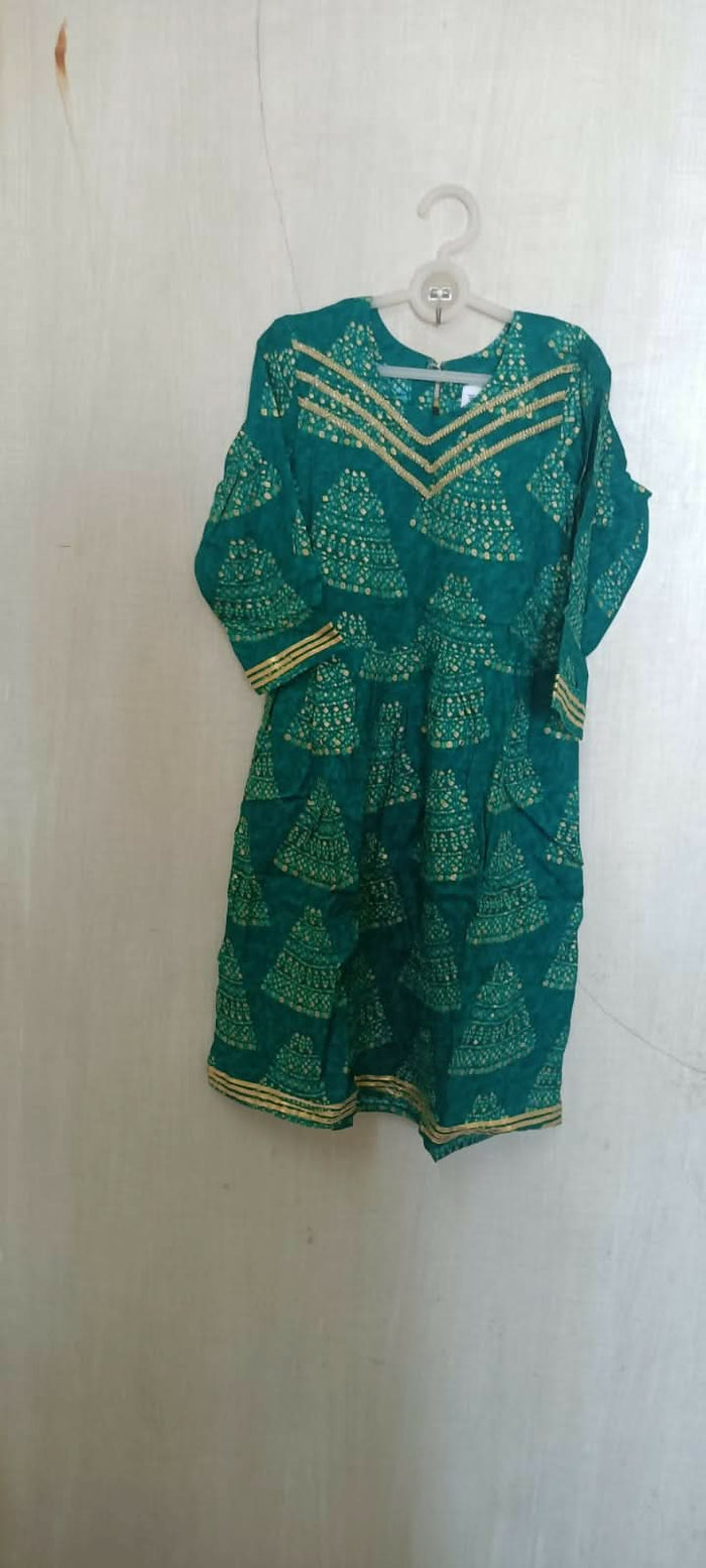 Make a style statement with our Beautiful Green Color Peplum Top and Garara Set, offering elegance and sophistication for festive occasions and parties.