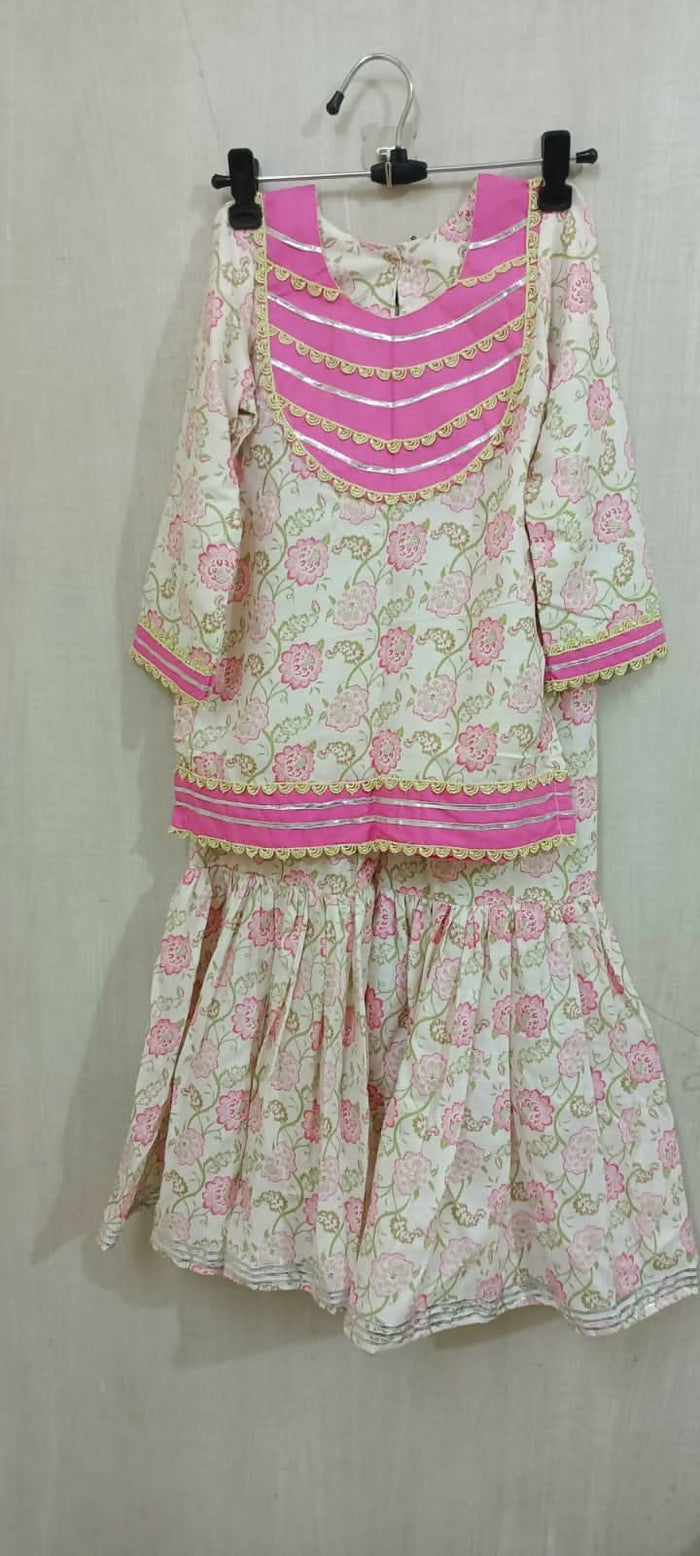 Dress your little darling in the Pink Floral Print Garara Set - a perfect blend of elegance and playfulness for her special occasions.