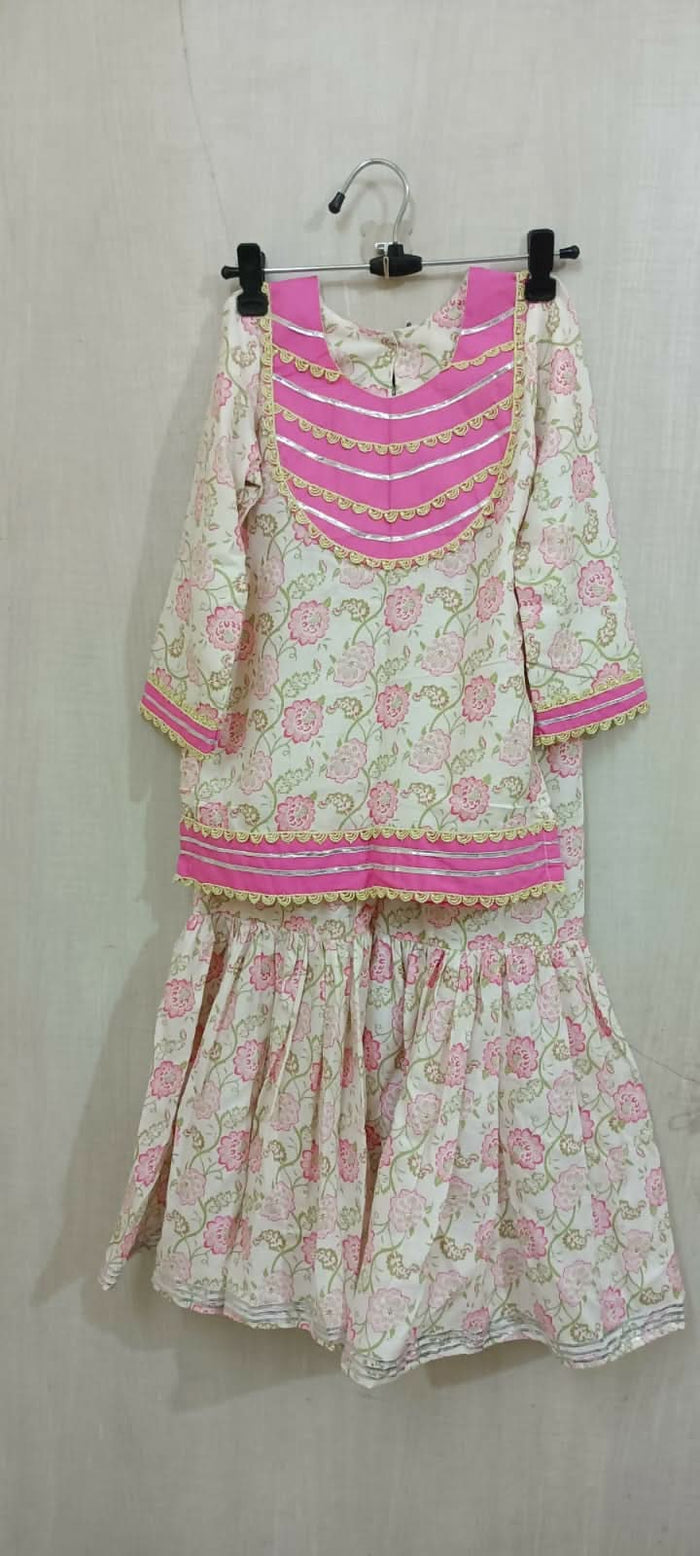 Dress your little darling in the Pink Floral Print Garara Set - a perfect blend of elegance and playfulness for her special occasions.