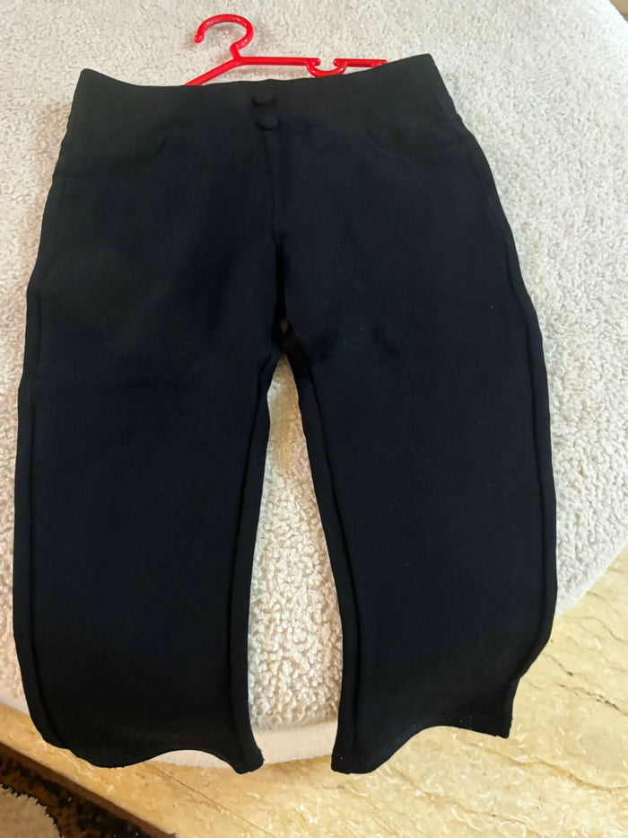 These Black Stretchable Jeggings for girls are a versatile wardrobe essential, offering both style and comfort.