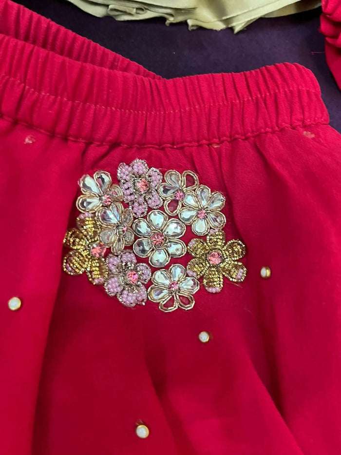 Pure georgette lehenga set for baby girls with handwork butti and matching accessories, plus a stylish baby boy kurta-pyjama set for festive elegance.