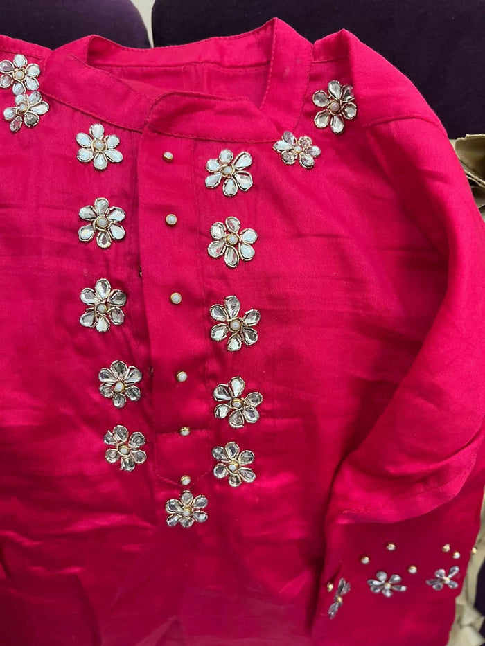Pure georgette lehenga set for baby girls with handwork butti and matching accessories, plus a stylish baby boy kurta-pyjama set for festive elegance.