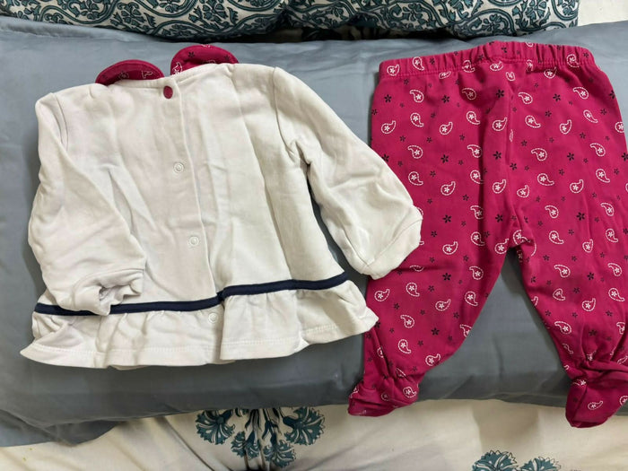 Keep your baby snug during mild chilly days with this soft cotton top and bottom set.