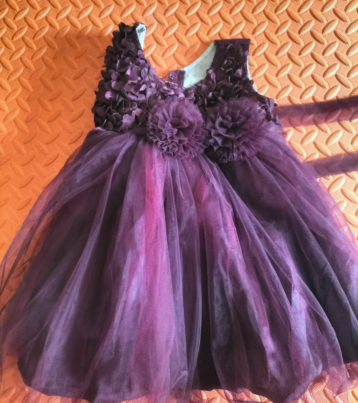 Dress your baby girl in the elegant Dark Purple Frock/Dress – a perfect outfit for special occasions, crafted for comfort and style with a rich dark purple hue.