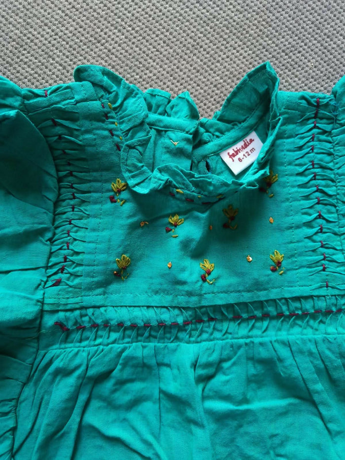 Adorn your baby girl with the FAB INDIA Ethnic Top and Pant set – a stylish and comfortable outfit featuring vibrant colors and intricate designs, perfect for festive occasions and family gatherings.