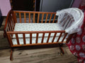 Give your baby a safe and stylish sleeping space with the versatile First Step Cradle perfect for a peaceful nursery!