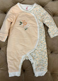 Keep your baby cozy and stylish with the HAMLEYS Baby Quilt Romper, crafted from soft and breathable fabric for all-day comfort. The quilted design adds warmth and texture, making it perfect for cooler days. Ideal for playtime or outings, this romper combines style and functionality for your little one.