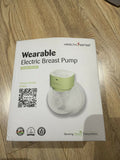 HealthSense Wearable Breast Pump with 3 pumping modes, hands-free wearable design, adjustable suction levels, rechargeable battery, quiet operation, leak-resistant collection cups, and BPA-free components.