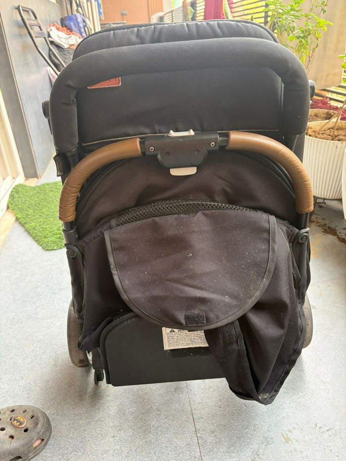KIDILO one-click foldable baby stroller with compact folding design, reclining seat, sturdy wheels, safety harness, and 20 kg weight capacity for comfortable baby travel.
