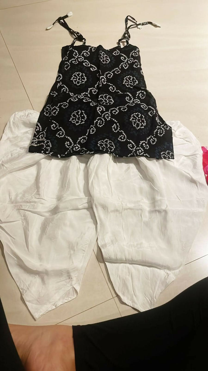 Elevate your baby girl's style with our Kurta and Sharara Set, crafted for traditional charm and comfort.