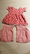 Elevate your baby girl's style with our Kurta and Sharara Set, crafted for traditional charm and comfort.