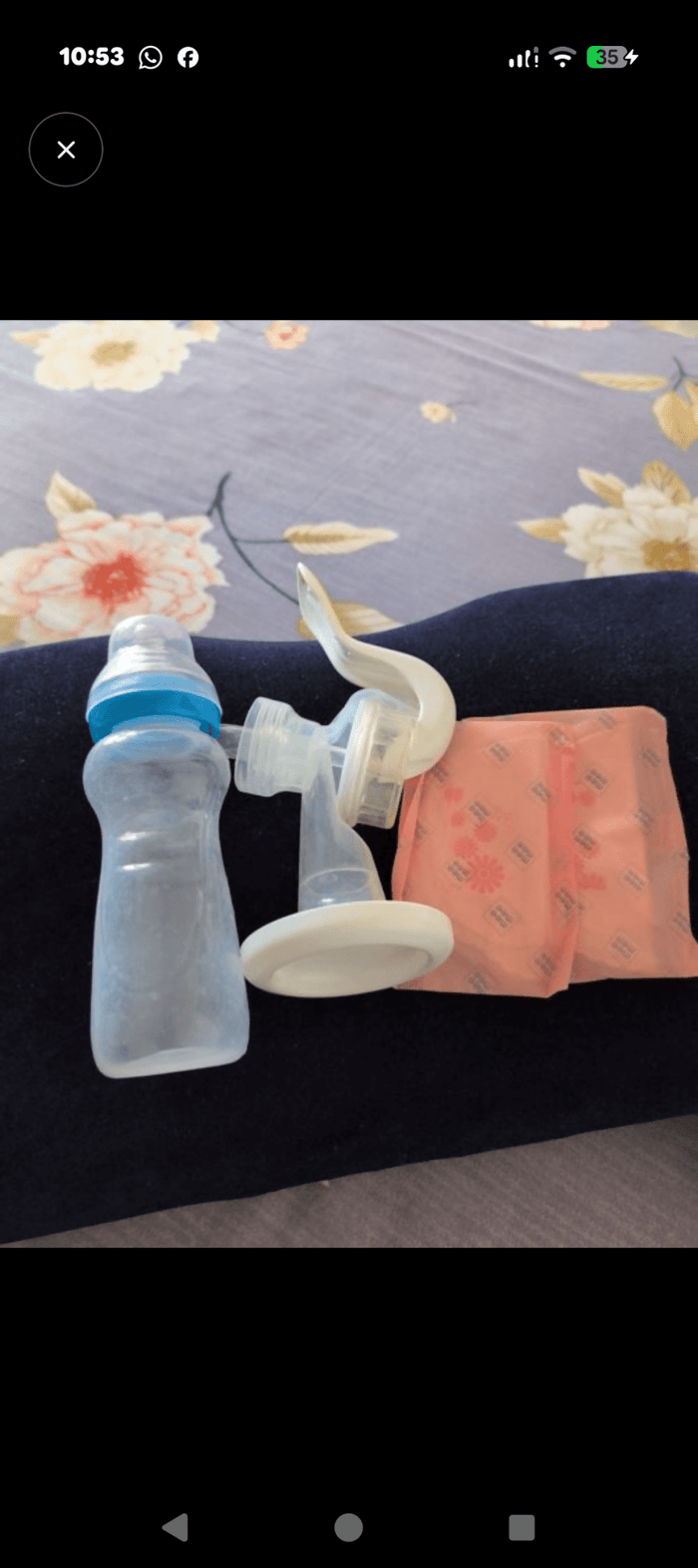 MEE MEE Manual Breast Pump with ergonomic hand pump, soft silicone massage cushion, BPA-free components, lightweight portable design, and comfortable manual milk expression for breastfeeding mothers.