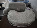 Brest Friend Deluxe Nursing Pillow with supportive wrap-around design, firm cushioned surface, adjustable fit, and comfortable back support for breastfeeding and bottle-feeding sessions.