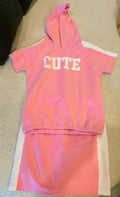 Shop now for the Pink T-shirt with Cap and Short Skirt set, offering comfort, style, and adorable charm for your baby’s everyday wear!