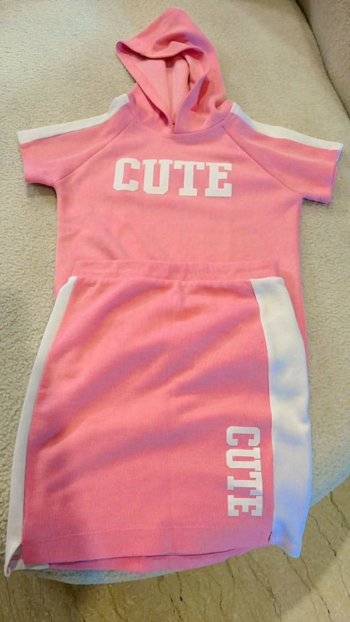 Shop now for the Pink T-shirt with Cap and Short Skirt set, offering comfort, style, and adorable charm for your baby’s everyday wear!