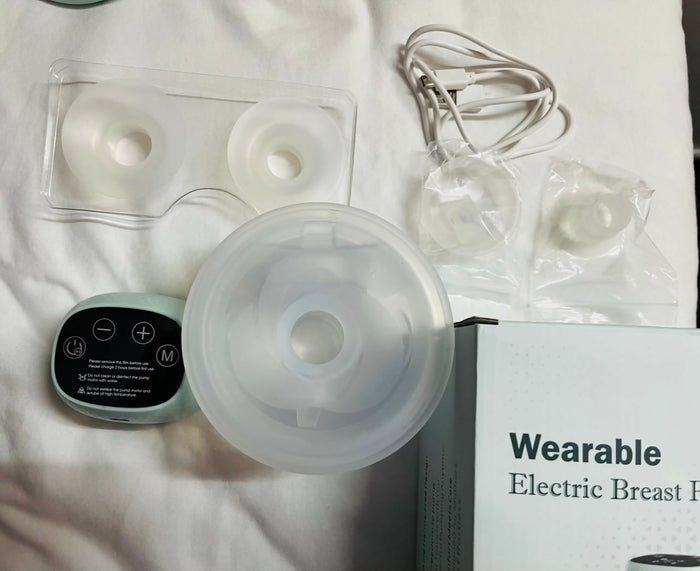 ROBOSSAN Automatic Electric Breast Pump in Preloved New condition featuring convenient electric operation, adjustable pumping settings, comfortable breast cushion, and easy-to-use design for everyday breast milk expression.