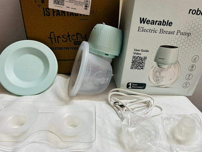 ROBOSSAN Automatic Electric Breast Pump in Preloved New condition featuring convenient electric operation, adjustable pumping settings, comfortable breast cushion, and easy-to-use design for everyday breast milk expression.
