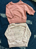 Set of 2 baby sweatshirts (H&M & Lullaby Baby) – warm, soft, and stylish for 0–5 months.