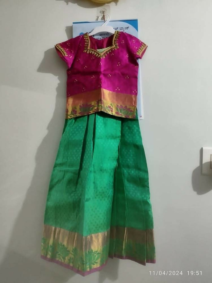 Dress your little girl in luxury and elegance with our Silk Lehenga and Blouse set, perfect for special occasions and celebrations.