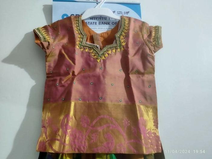 Dress your little girl in luxury and elegance with our Silk Lehenga and Blouse set, perfect for special occasions and celebrations.