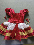 Dress your baby girl in the South Indian Style Silk Partywear Dress – a luxurious and elegant outfit perfect for weddings and festivals, showcasing vibrant colors and traditional design elements.