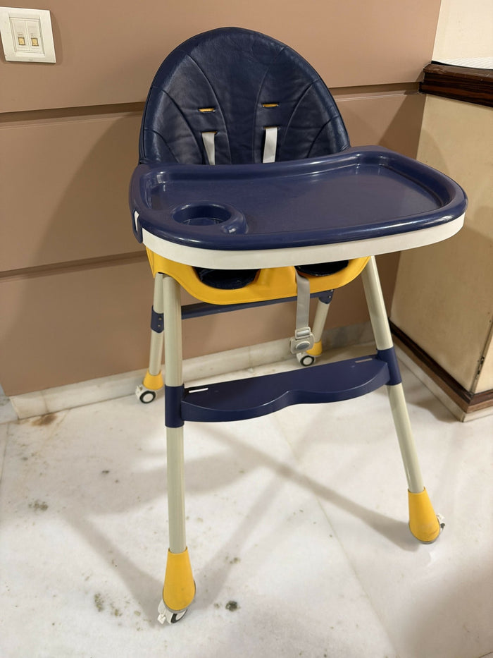 Star & Daisy High Chair with adjustable height, comfortable padded seat, safety harness, removable feeding tray, and foldable design for convenient and secure mealtimes for babies and toddlers.