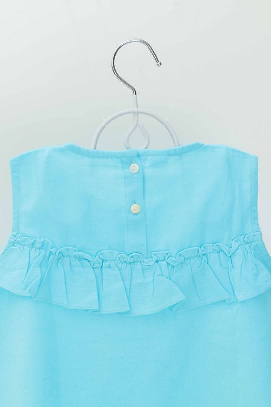 Discover the stylish blue umbrella cotton top for girls, featuring 100% soft, breathable cotton and a unique design, perfect for casual outings and special occasions.