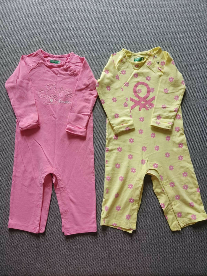 Dress your baby girl in comfort and style with the United Colors of Benetton Pack of 2 Pure Cotton Rompers – featuring charming designs, vibrant colors, and easy snap closures for everyday wear.
